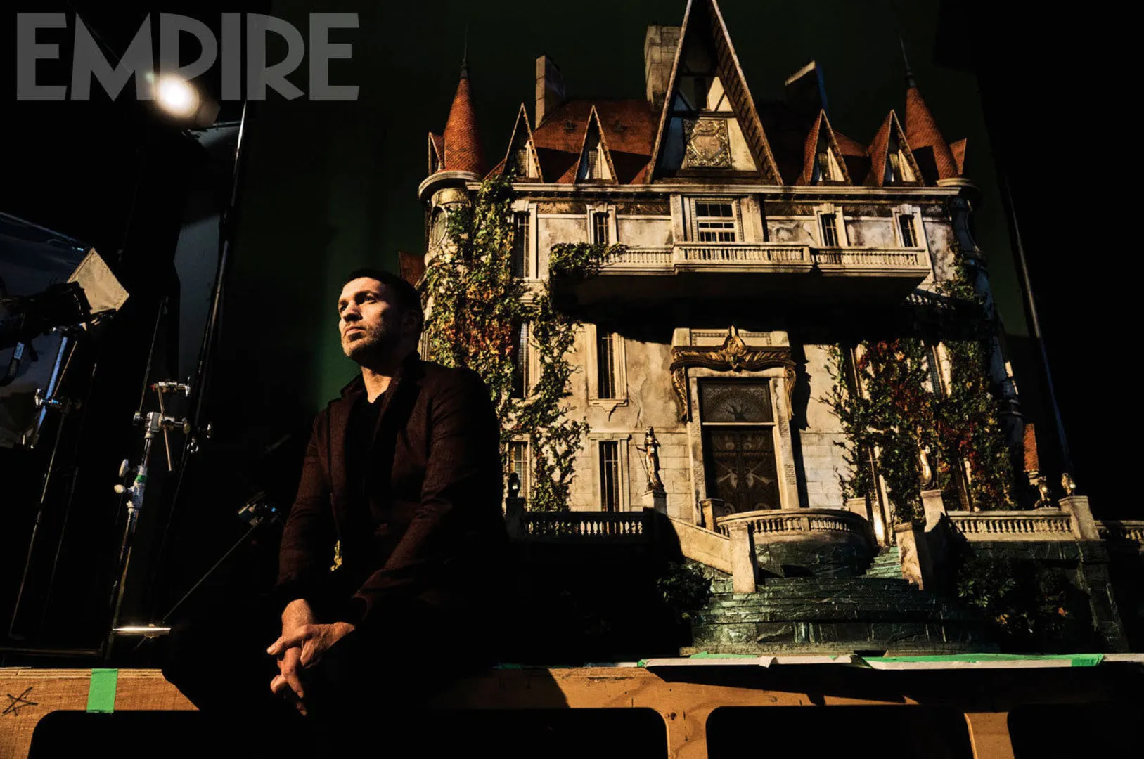 Travis Knight standing in front of a 3D replica of Pittock Mansion