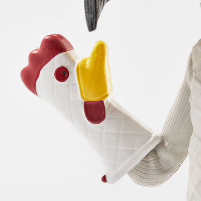 Close-up of the Other Mother Bobblehead's chicken oven mitt